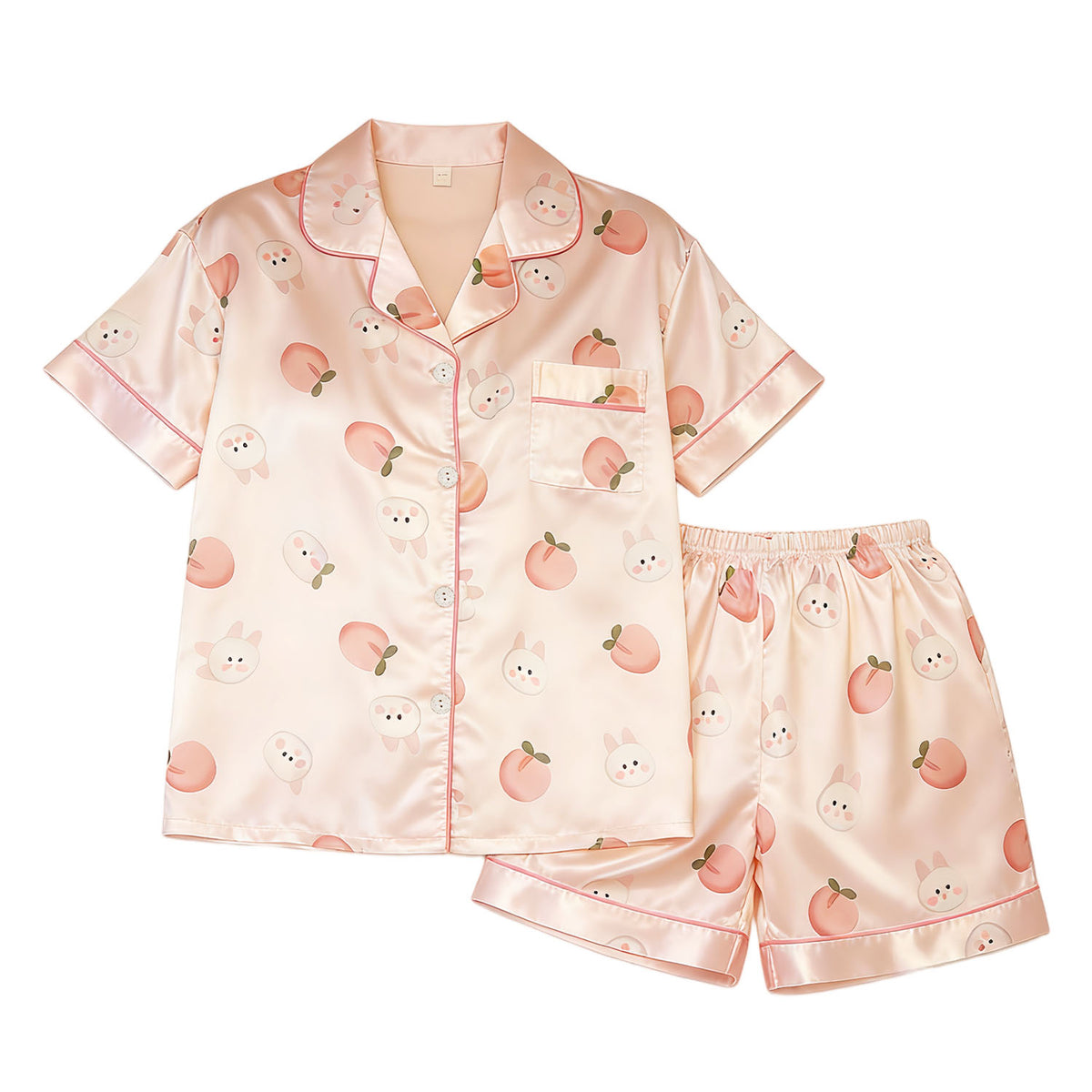 Pink pajama set with fruit pattern on a white background