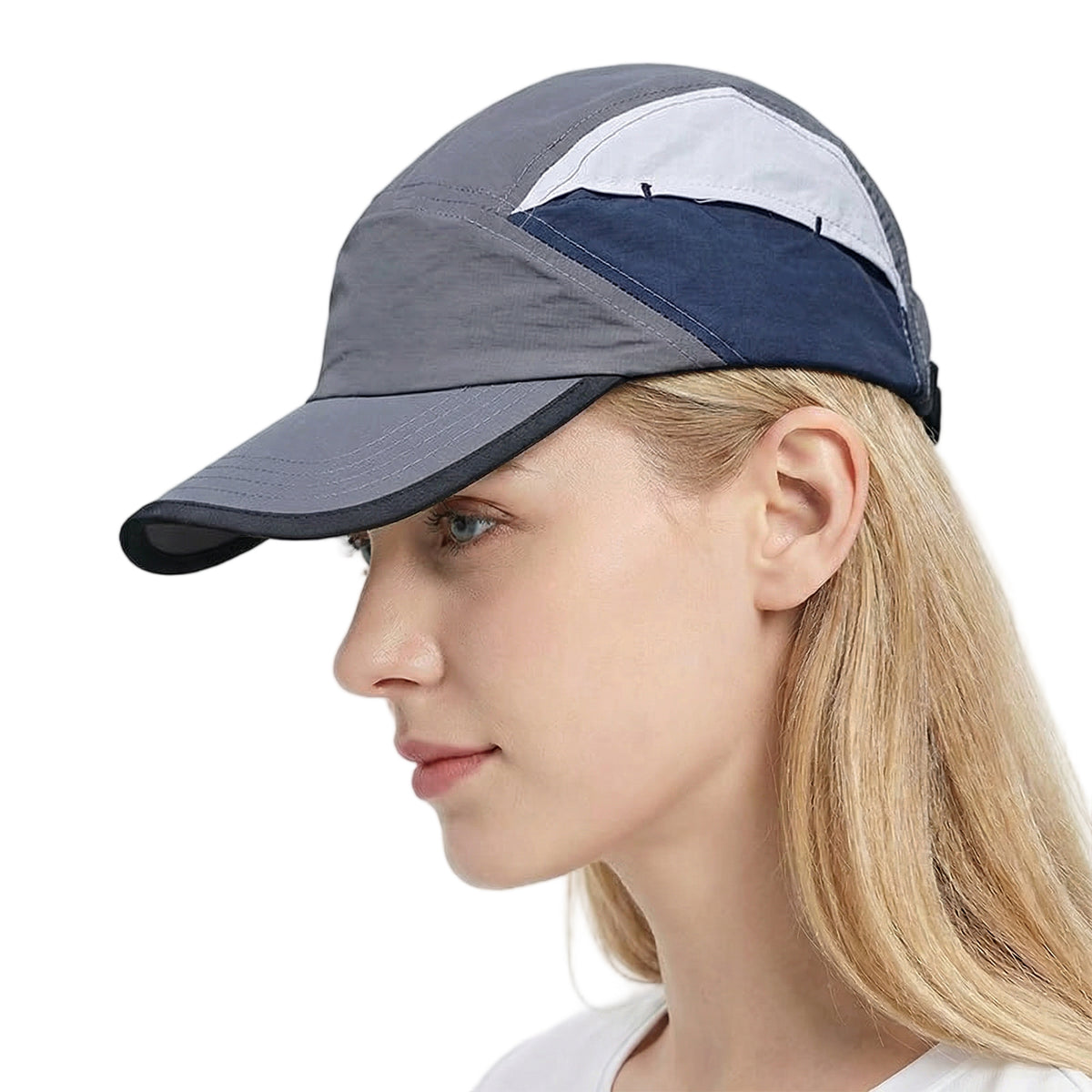 Venzina Sports Cap worn by woman in side profile showing gray, navy, and white lightweight panel design