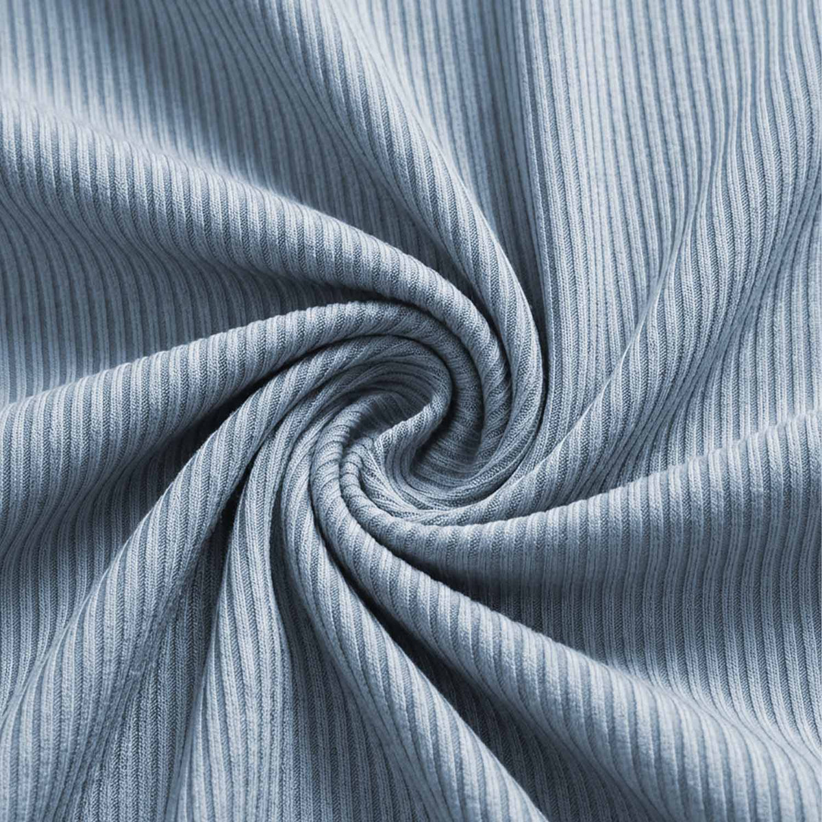 Venzina mens nightwear fabric close-up, light blue ribbed knit shown twisted to highlight texture and stretch details