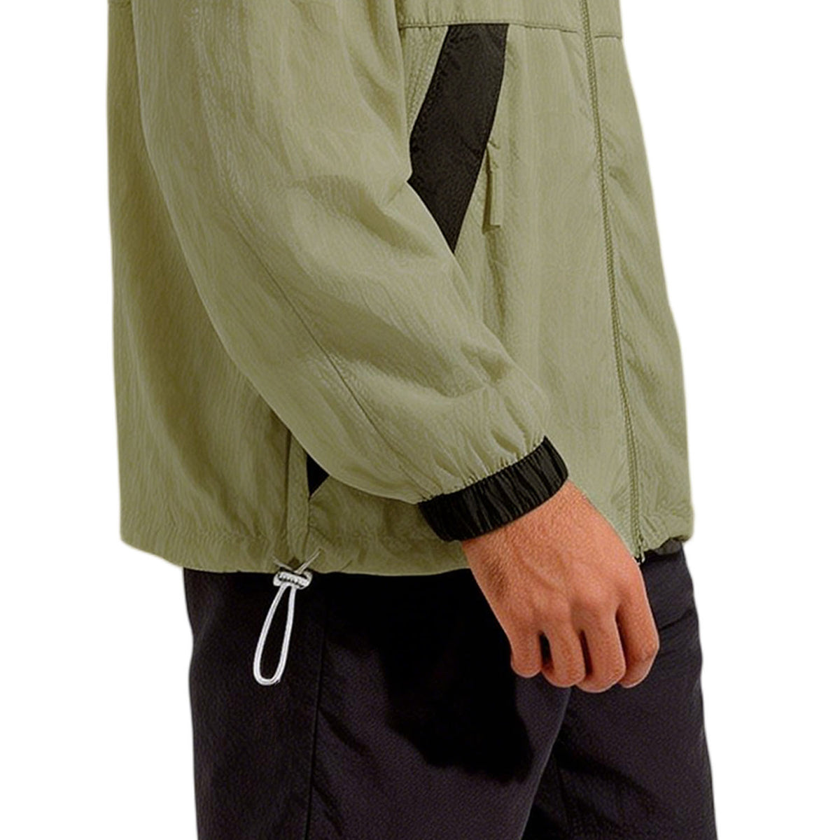 Venzina sunscreen jacket detail, side hem drawcord toggle and black cuff on olive fabric, white background