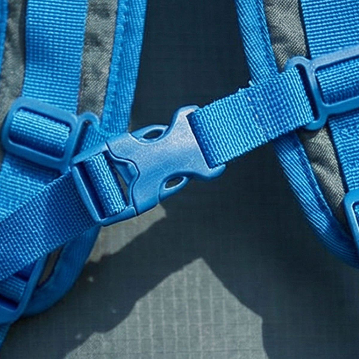 Venzina waterproof foldable backpack, blue strap buckle detail close-up