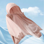 Venzina women's sun protection jacket laid flat, light pink hooded design with visible mesh lining shown floating against blue sky background