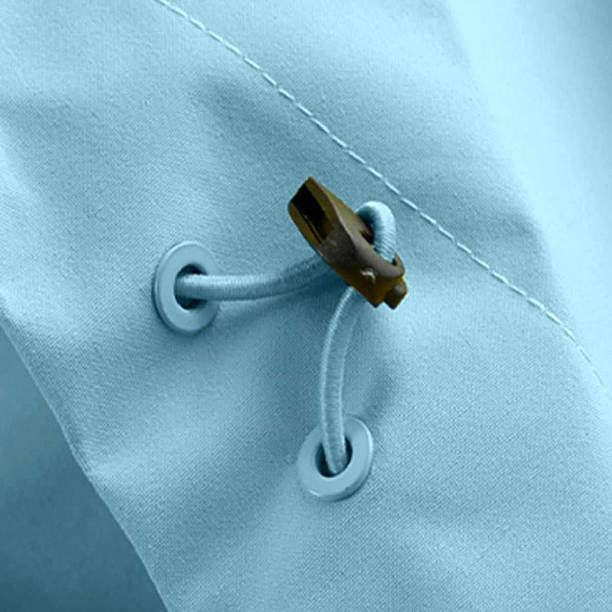 Close up of drawcord and fabric detail on men’s hiking jacket