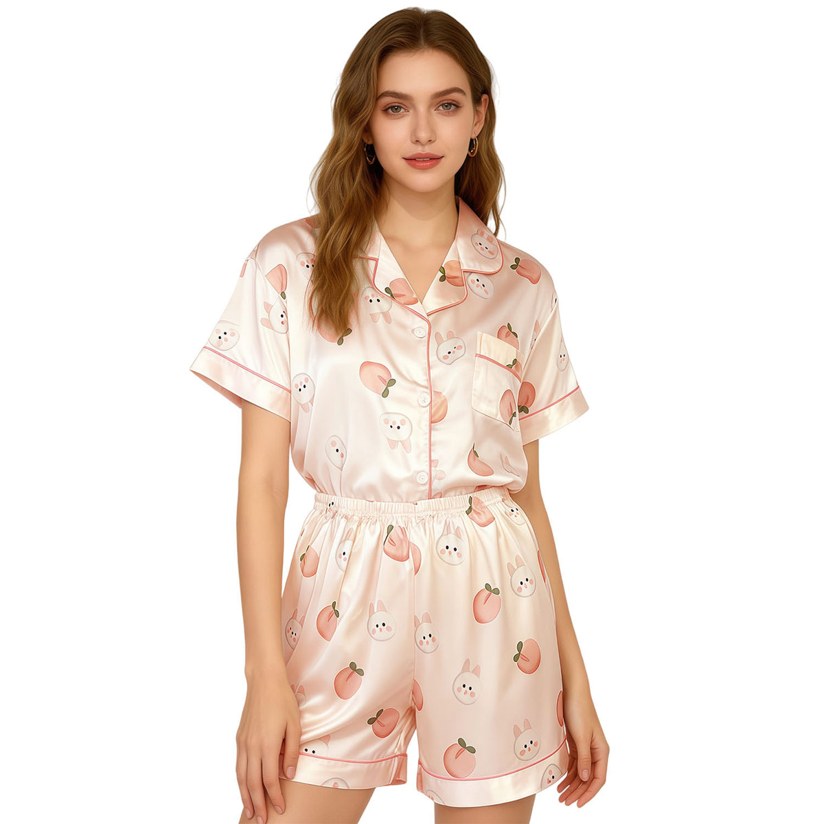 Pink satin women’s night suit front view with short-sleeve top and shorts