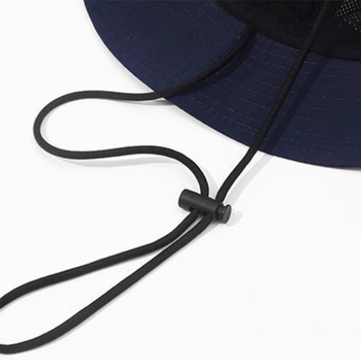 Venzina Bucket Hat close-up showing adjustable chin strap cord and brim stitching