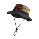 Venzina Bucket Hat side view showing wide brim, stitched panels, and adjustable chin strap