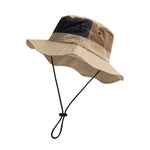 Venzina Bucket Hat side view showing wide brim, stitched panels, and adjustable chin strap