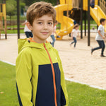 Venzina boy wearing yellow and navy waterproof hooded windbreaker at playground